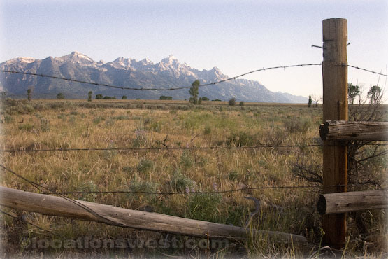 fenceline and mountain range
